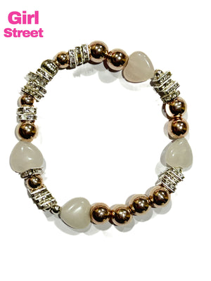 Heart bracelet it’s a a stylish Jeans Bracelet with rose quartz hearts and square spacer beads with golden balls