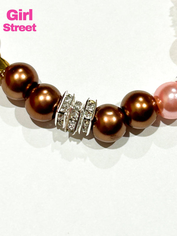 Charm bracelet it’s a Pandora bracelet with Pink And Brown Pearls Bracelet from women’s accessories a beautiful gift bracelet