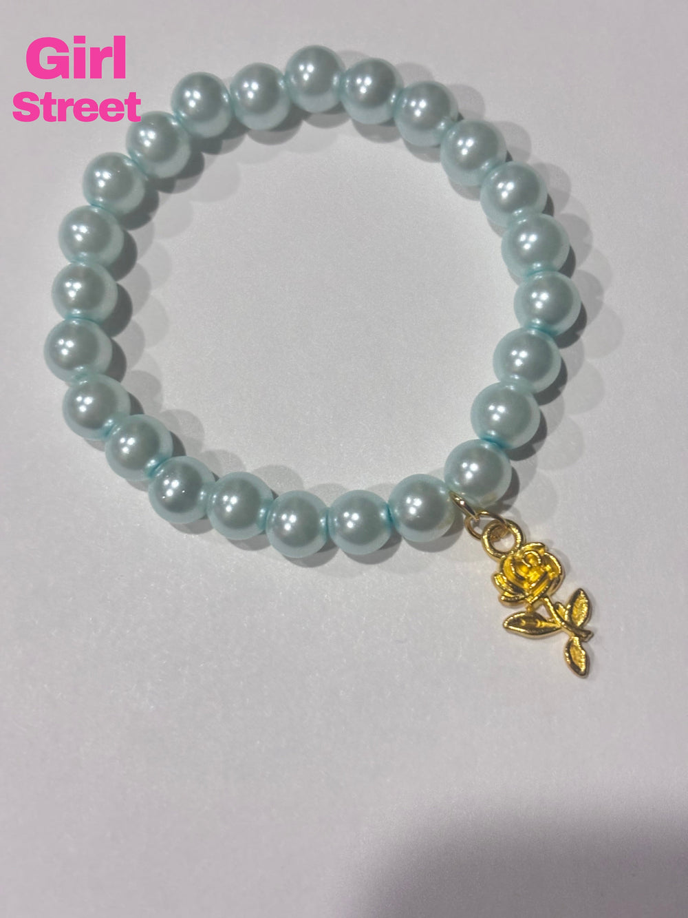 Sky Blue Bracelet With Golden Rose